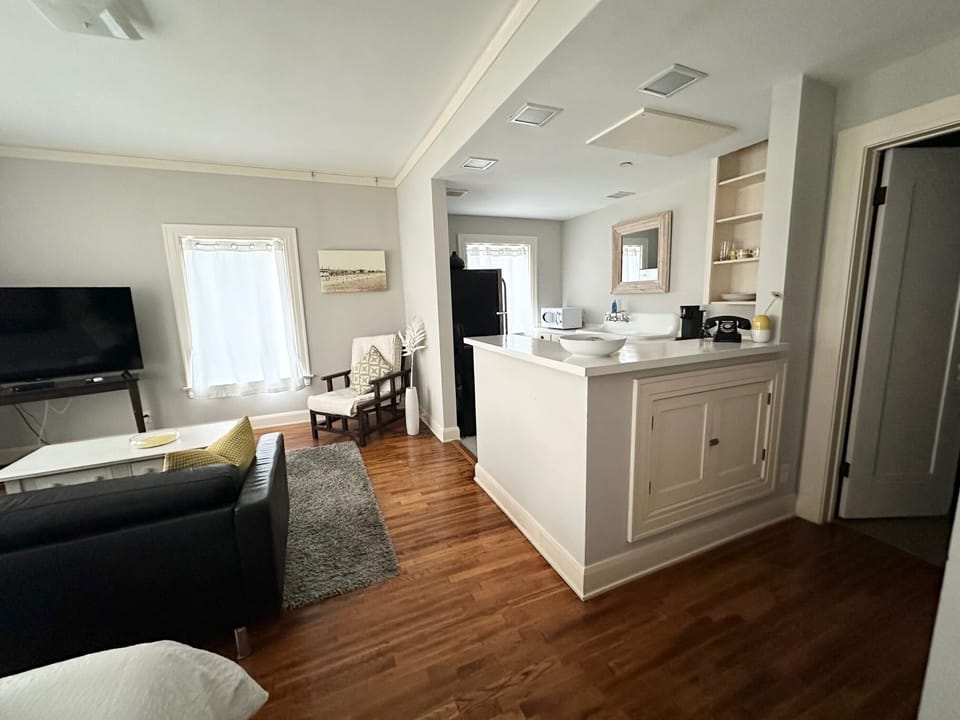 Large Studio | Living area | 55-inch Smart TV with satellite channels