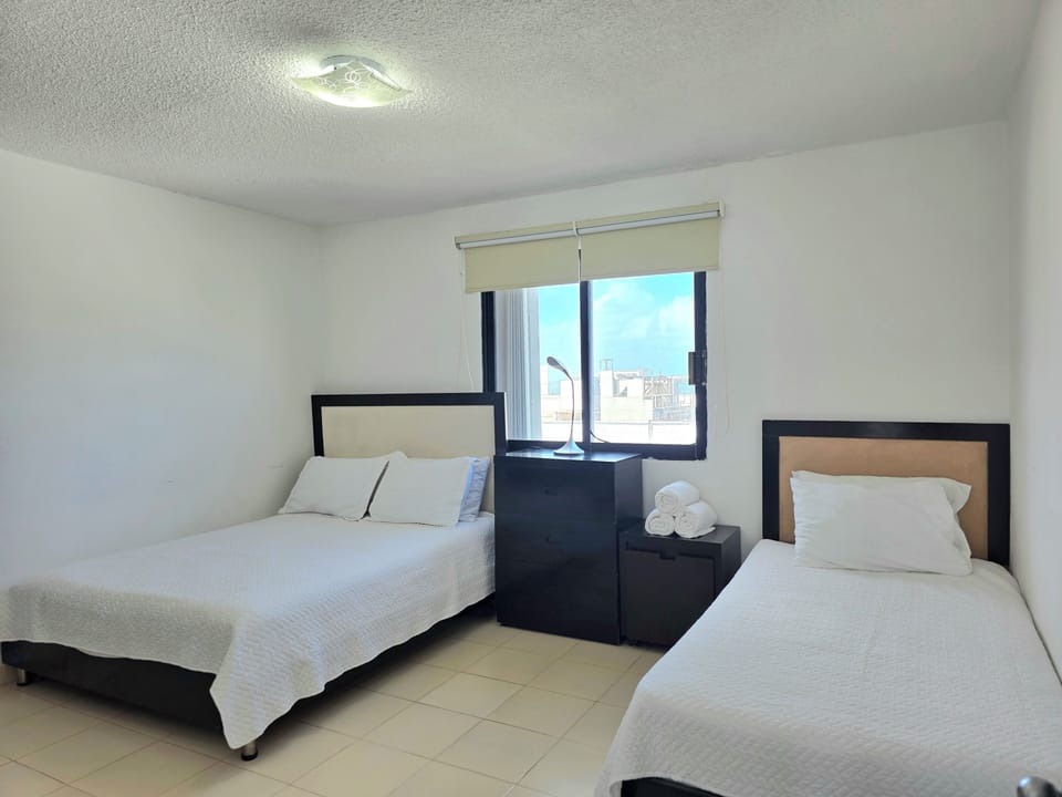 Family Apartment | 2 bedrooms, in-room safe, desk, blackout drapes