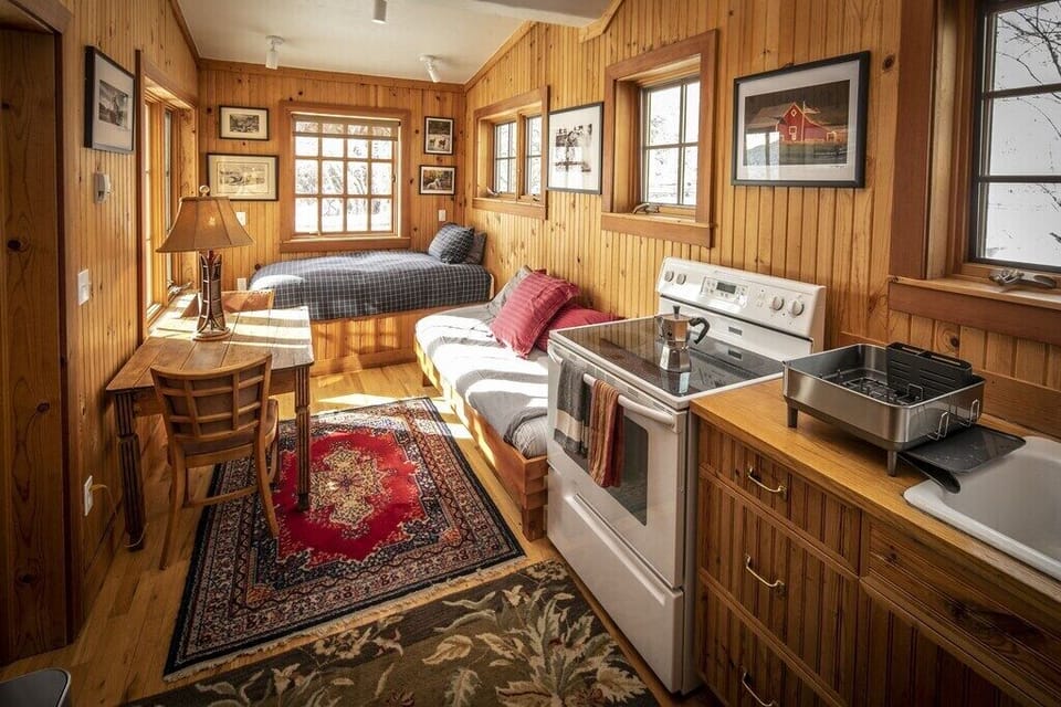 The Bunkhouse Kitchen and twin beds.
