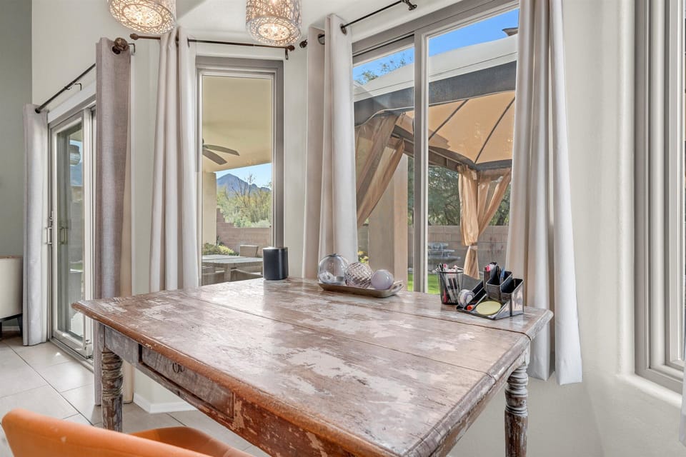 This kitchen nook invites you to settle in with a laptop, coffee, or book.