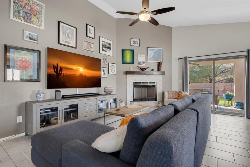 77" OLED TV with Apple TV and Sonos—ideal for cozy nights with family or friends