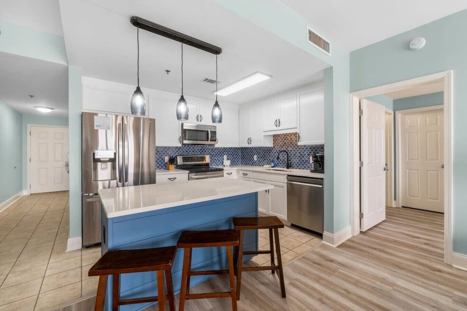 Fully Stocked Kitchen with Ocean Views and Island Bar Seating