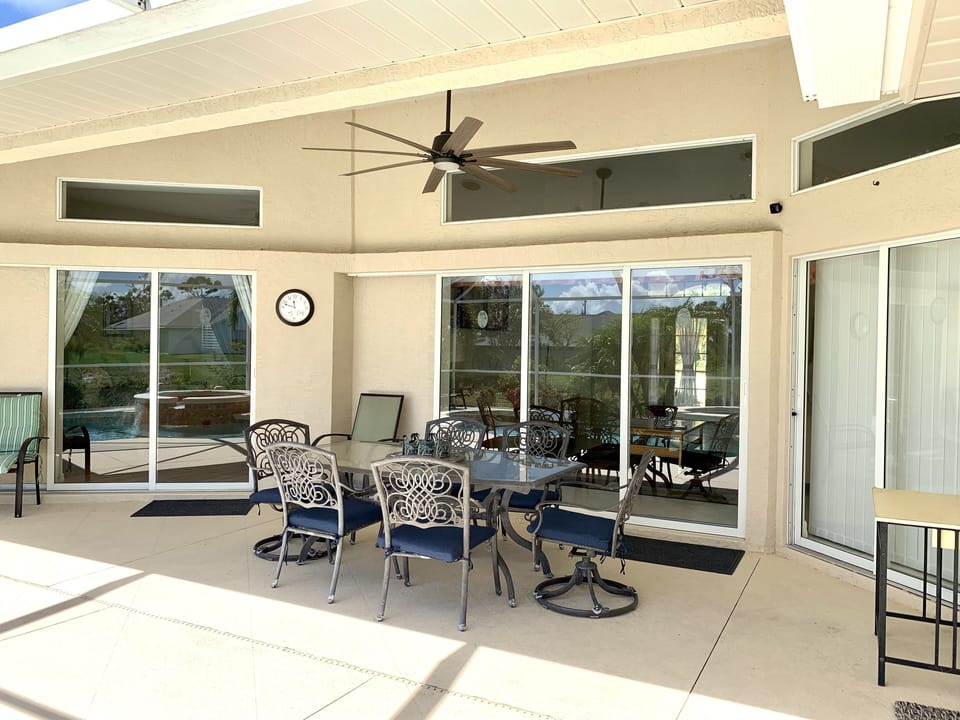 Covered lanai with large fan.