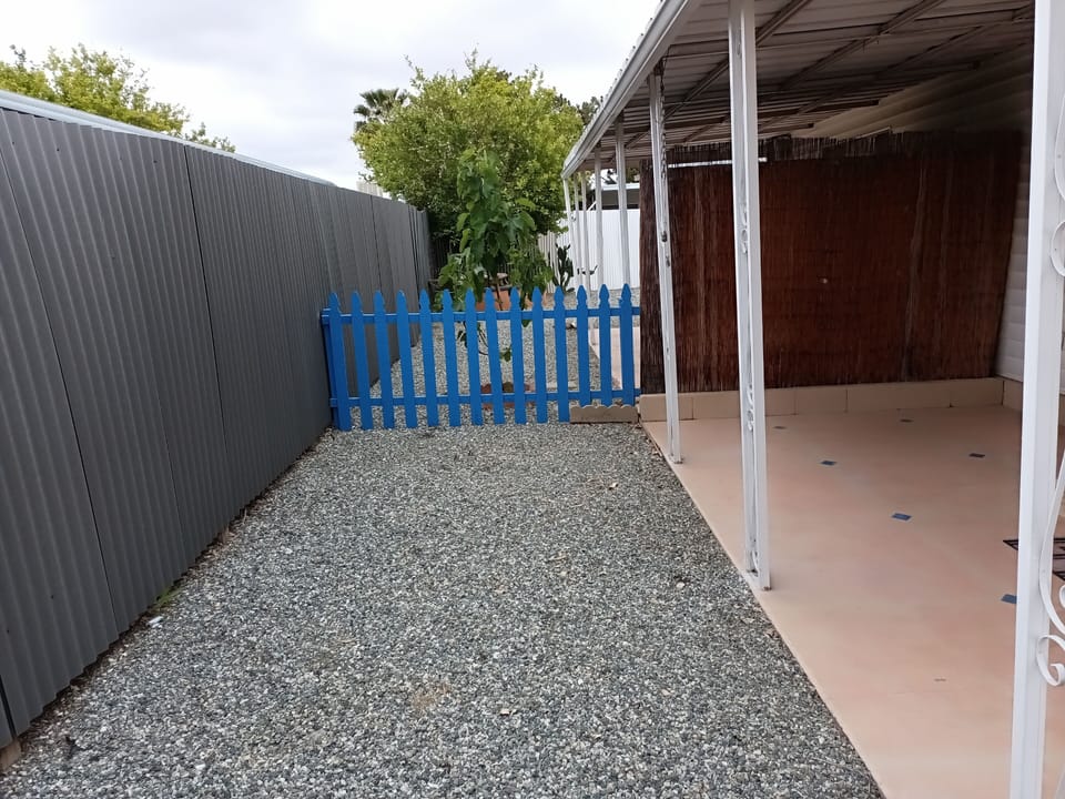 Side front and back covered porch.
