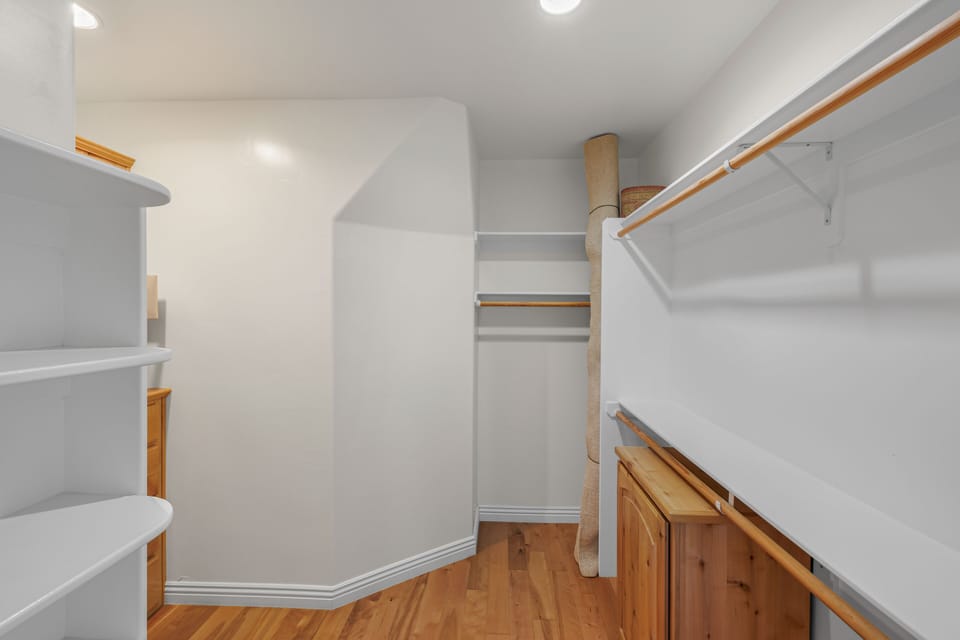 Primary bedroom's walk-in closet.