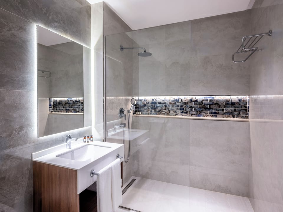 Shower, free toiletries, hair dryer, bathrobes