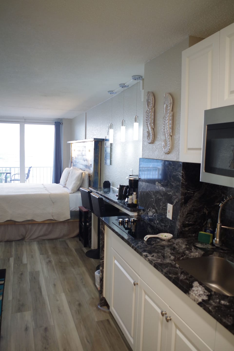 Looking from the hallway and bathroom towards the ocean