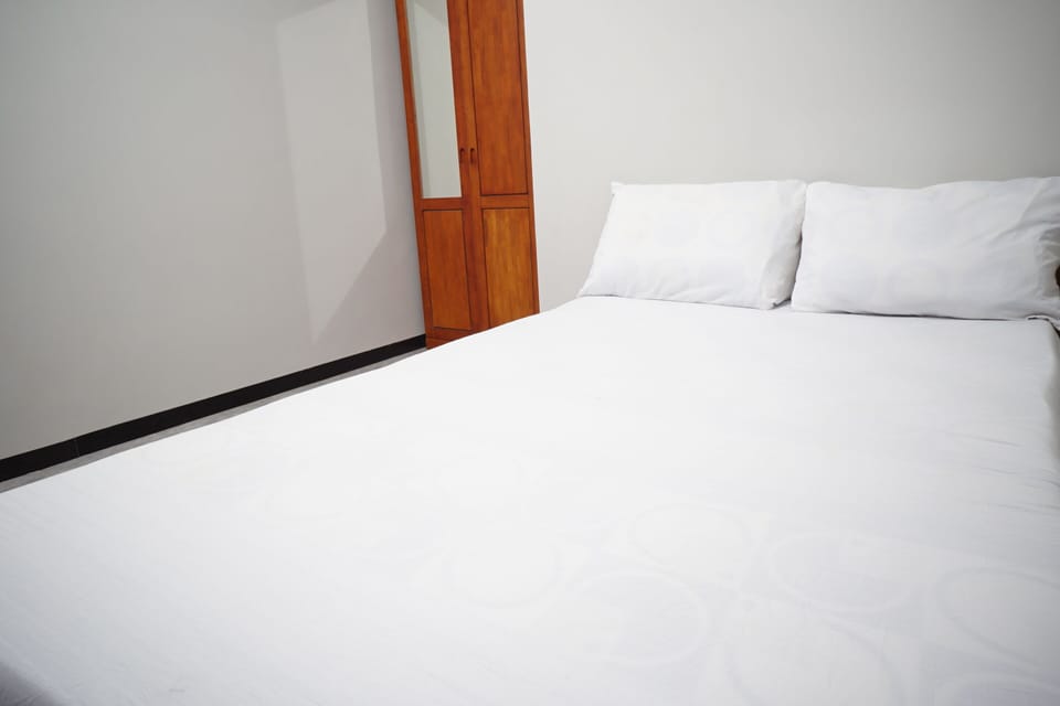 Deluxe Room | 1 bedroom, laptop workspace, free WiFi, bed sheets