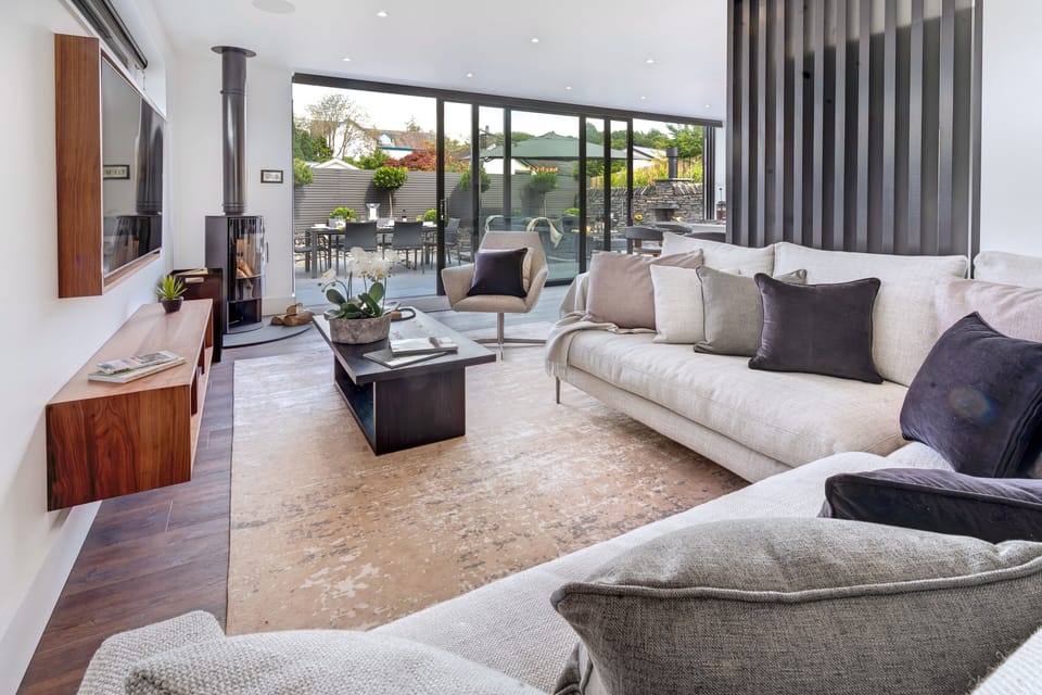 Stylish and Relaxing Open Plan Living Area with built Log Burner.