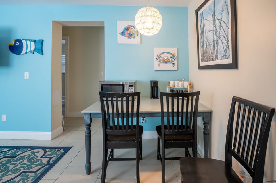 Eat-in living room with microwave, coffee bar and mini-fridge