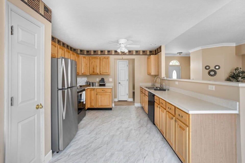 Our kitchen is not just a cooking space; it's a clean and thoughtfully designed haven equipped with kitchen essentials and utensils.