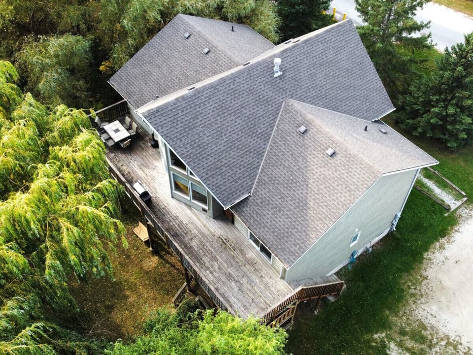 View of the entire chalet from above from the back right-hand corner of the property