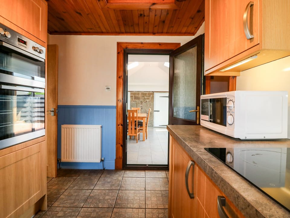 Fridge, electric kettle, toaster, cookware/dishes/utensils