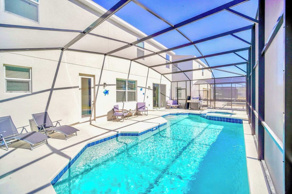 Sundeck Loungers and Patio Grill for Poolside Dining