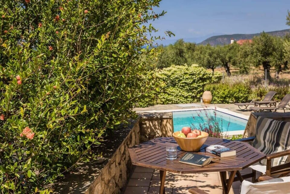 Patio of the Property – Shaded outdoor corner perfect for coffee, dining, or quiet moments in nature.