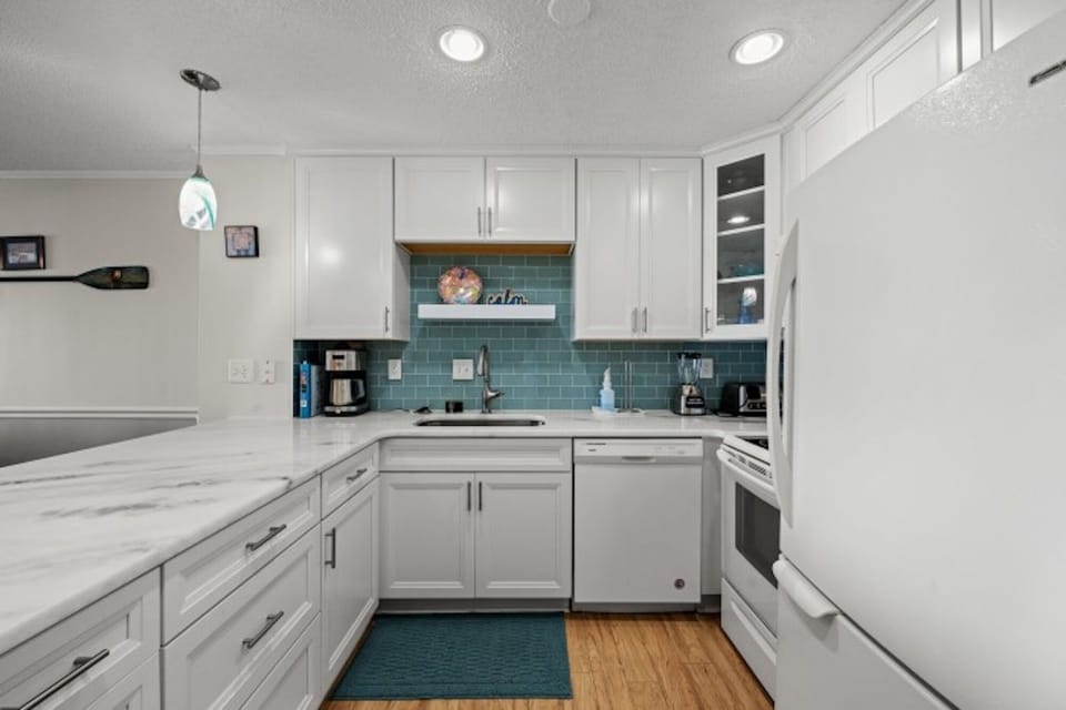 An updated kitchen makes preparing meals a breeze.