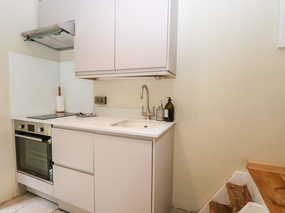 Fridge, electric kettle, toaster, cookware/dishes/utensils