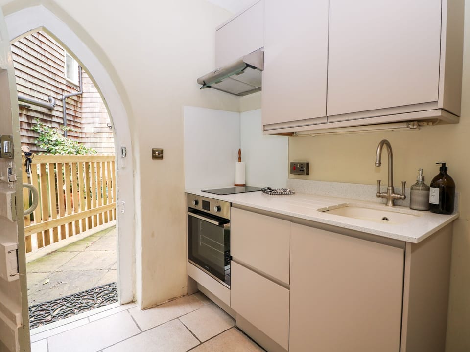 Fridge, electric kettle, toaster, cookware/dishes/utensils