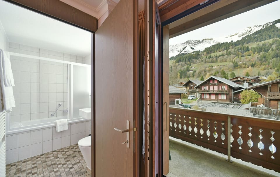 Superior Triple Room, Balcony | Bathroom | Shower, hair dryer, towels