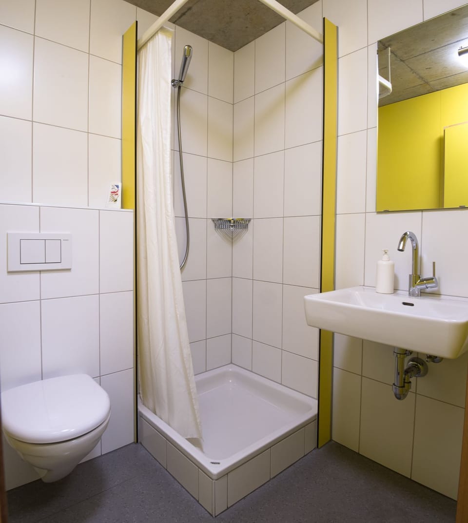 Twin Room | Bathroom | Hair dryer, towels