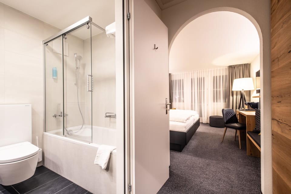 Bathtub, deep soaking tub, hair dryer, towels