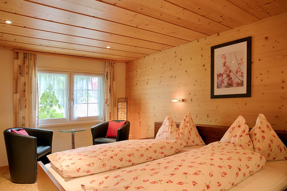 Comfort Room | Premium bedding, desk, laptop workspace, soundproofing