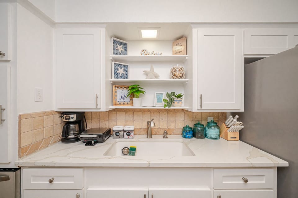 The kitchen offers an oversized sink and dishwasher to make cleaning up a breeze.