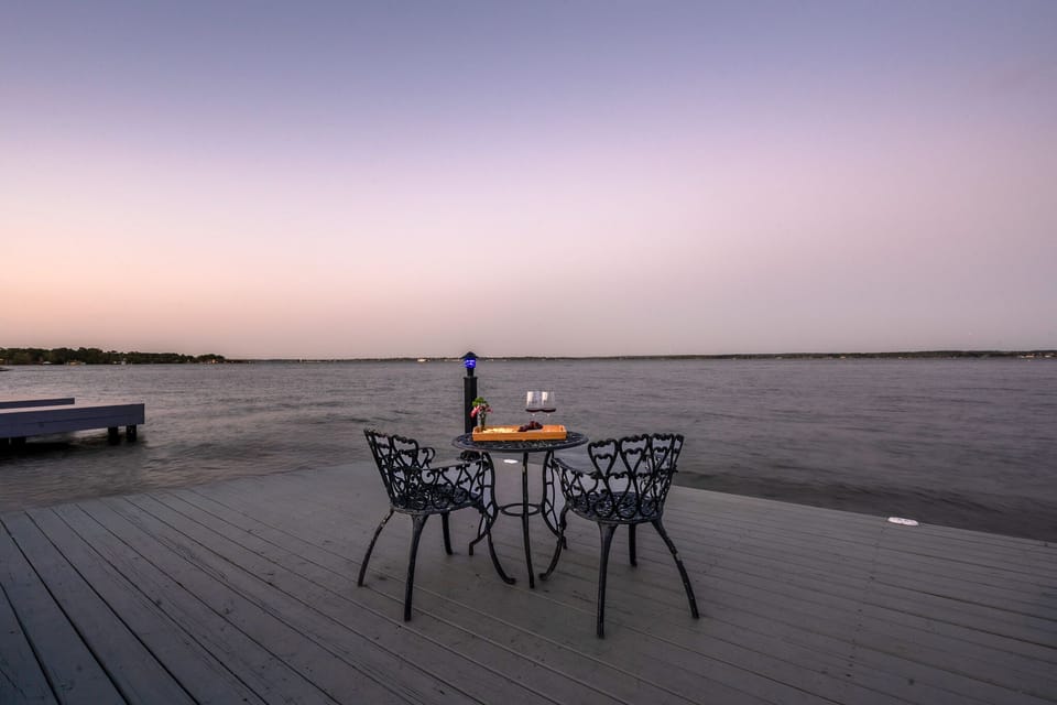 Sip, savor, and soak in the serenity—sunset moments right on the dock.