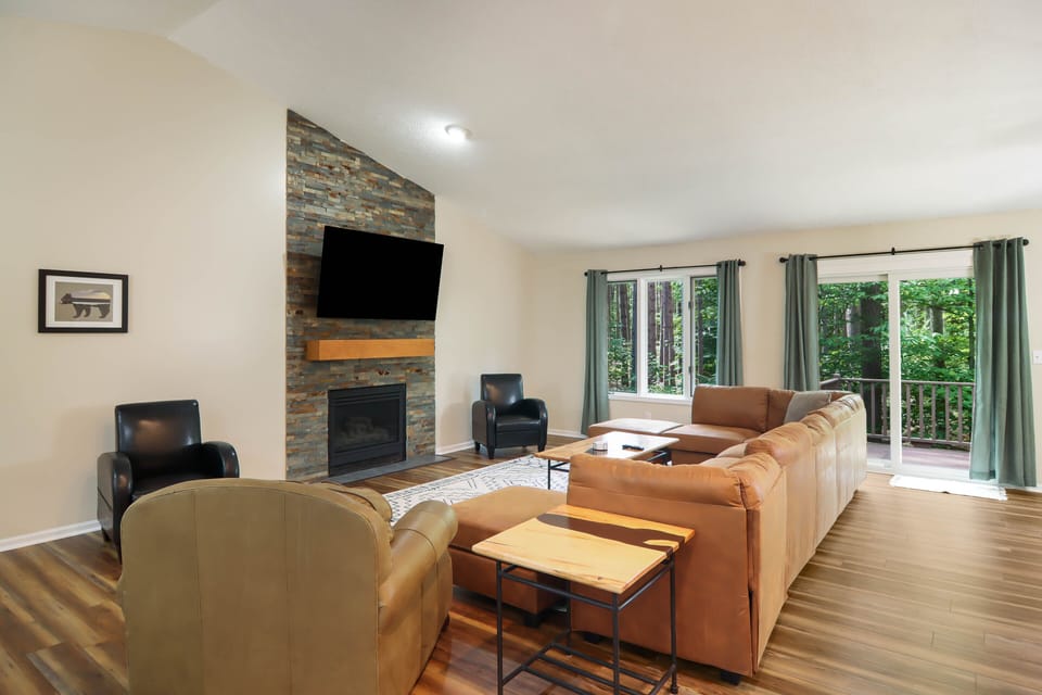 Main floor living room space with large couch