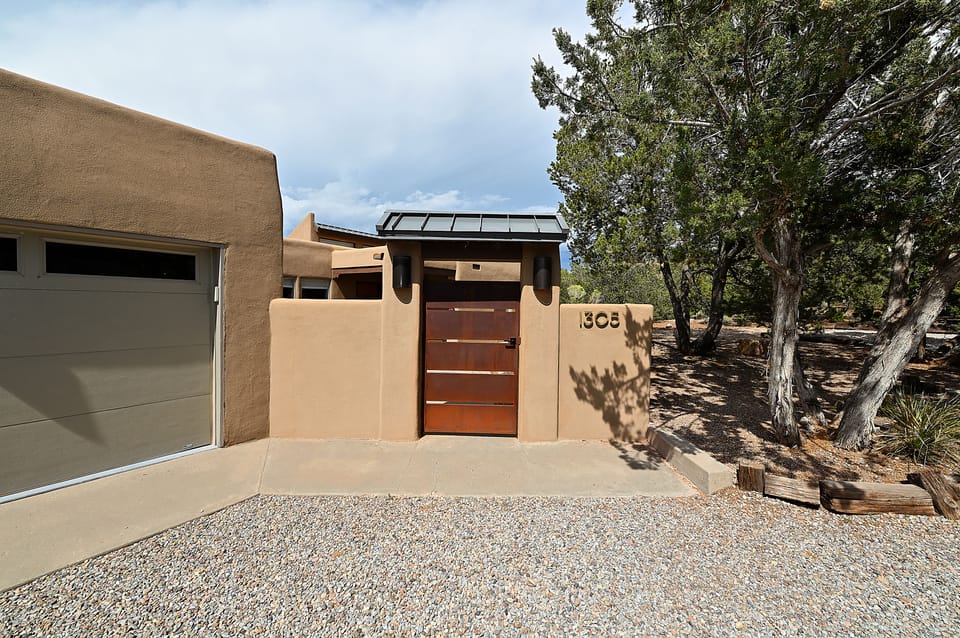 Entrance to home and front courtyard