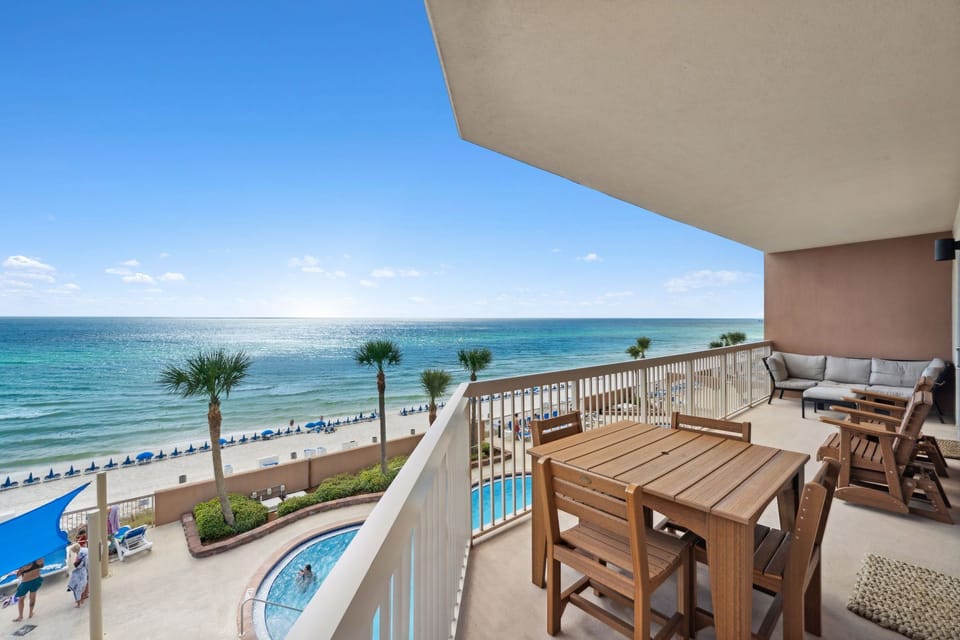 Private beachfront wrap around balcony perfect for sunrise coffee and sunset cocktails overlooking the Gulf
