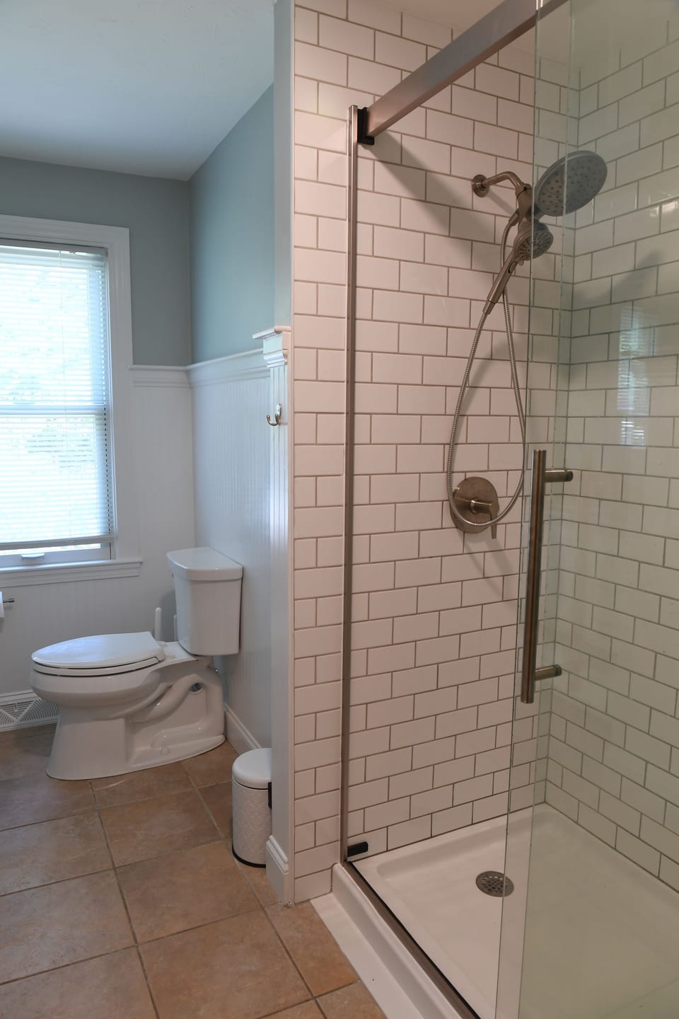 Hallway bathroom with walk-in shower (main level)