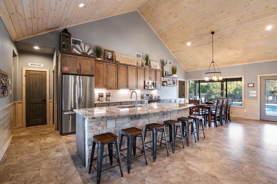 Breakfast bar seating and an over-equipped kitchen that gives you everything.