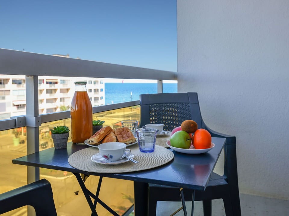 Table, Tableware, Food, Furniture, Sky, Window, Building, Chair, Interior Design, Outdoor Furniture