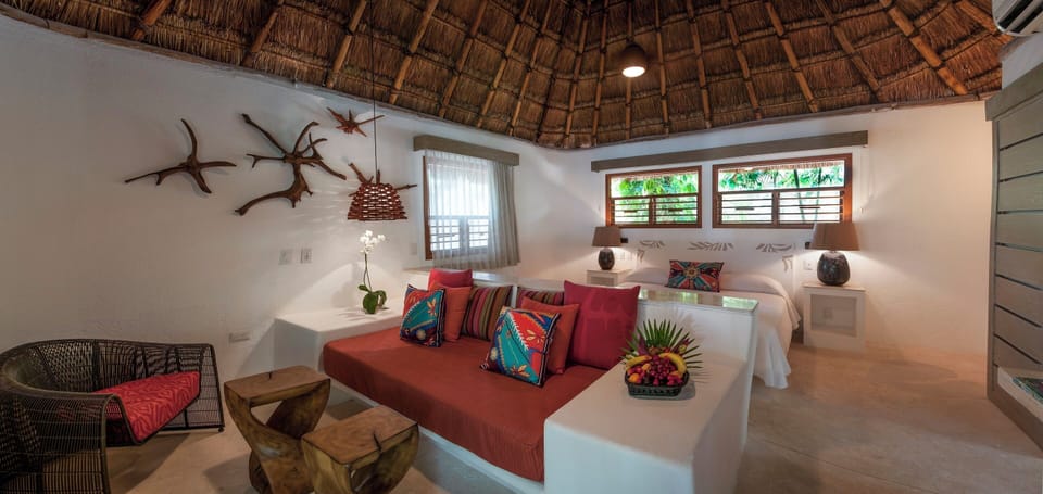 The Oasis Palapa | Premium bedding, down comforters, Select Comfort beds, minibar