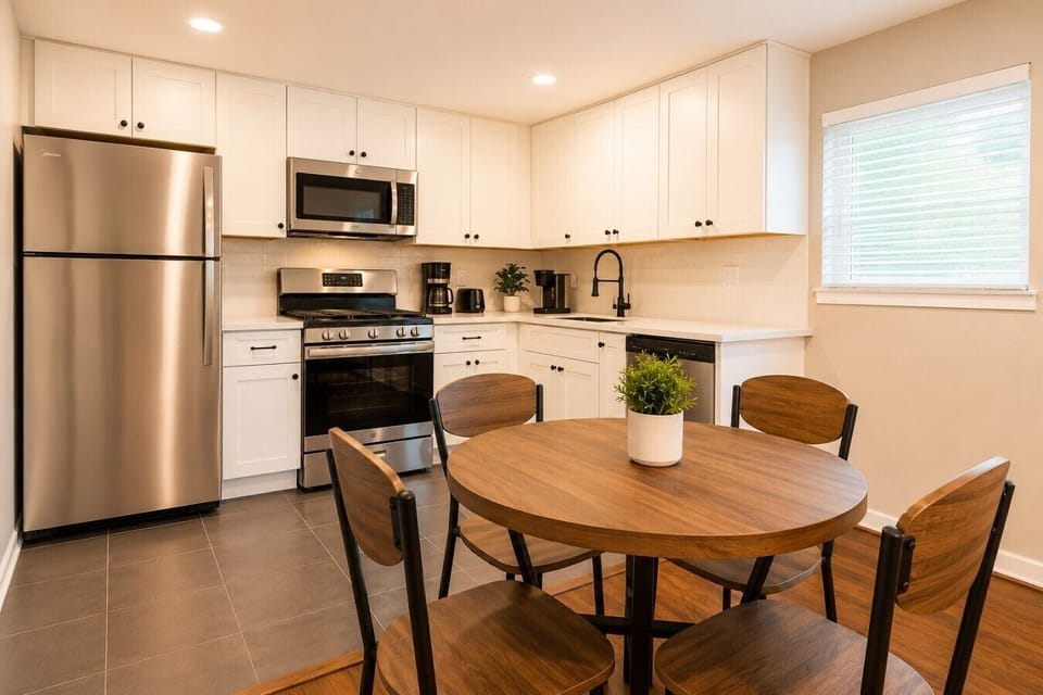 Bright and open kitchen with a cozy dining nook—great for meals at home.