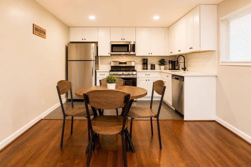 Bright and open kitchen with a cozy dining nook—great for meals at home.