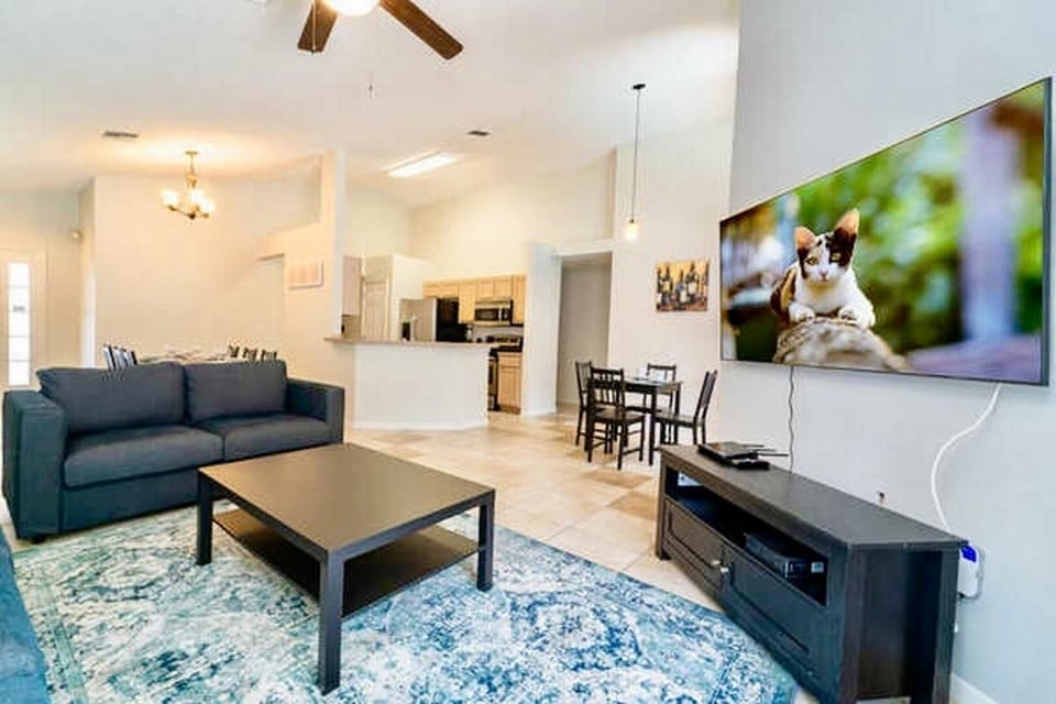 Full view of the living area, dining area and kitchen