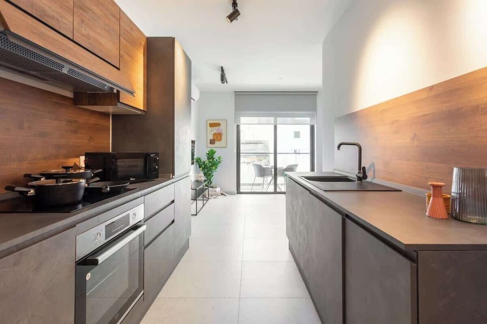The Kitchen - Indulge in culinary delights after a day of Maltese exploration. Create flavorful memories in our fully-equipped kitchen.