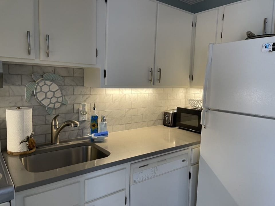 Disposal, microwave, toaster, Keurig maker, refrigerator, ice maker, stove!
