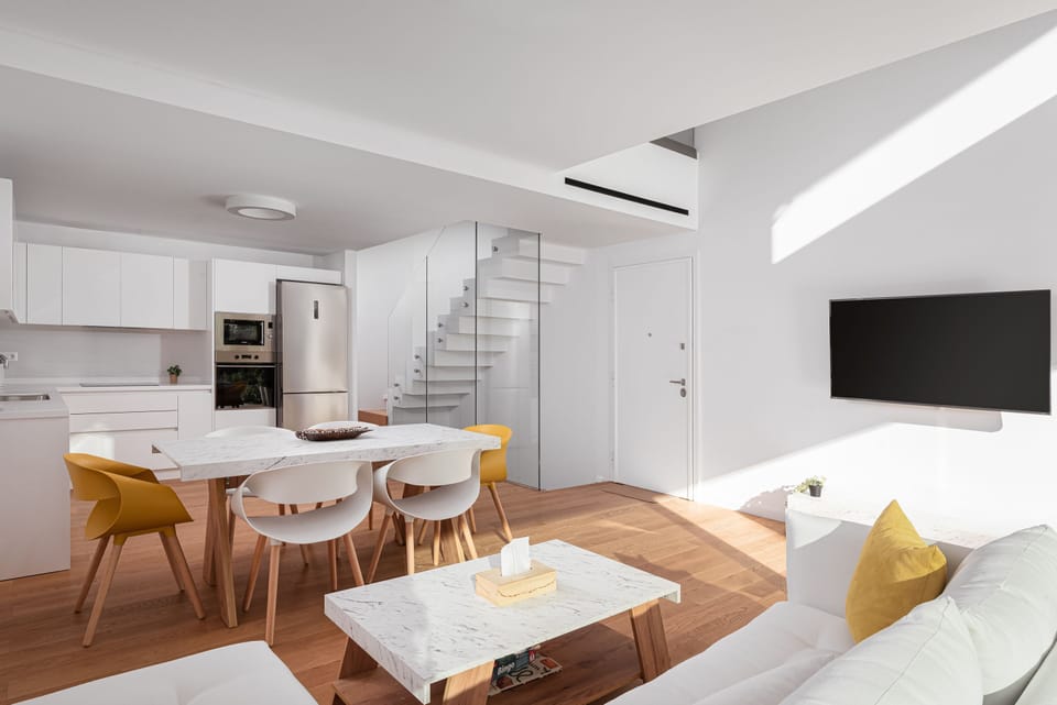 Signature Apartment | Living area | 50-inch Smart TV with digital channels, Netflix, streaming services