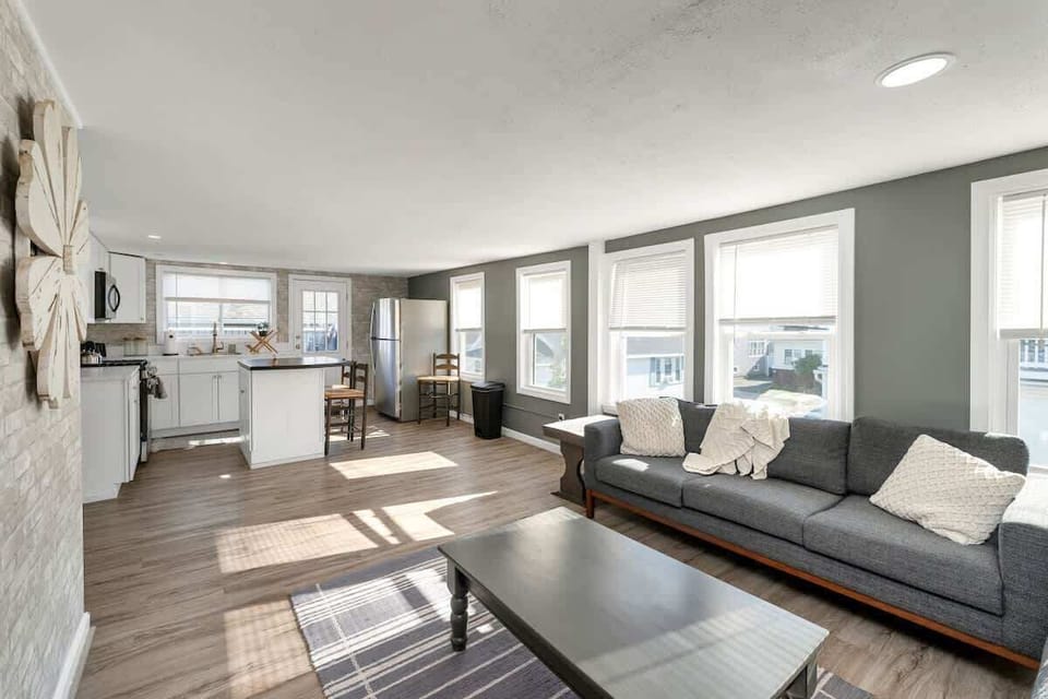 Living and Kitchen area with the door to the balcony