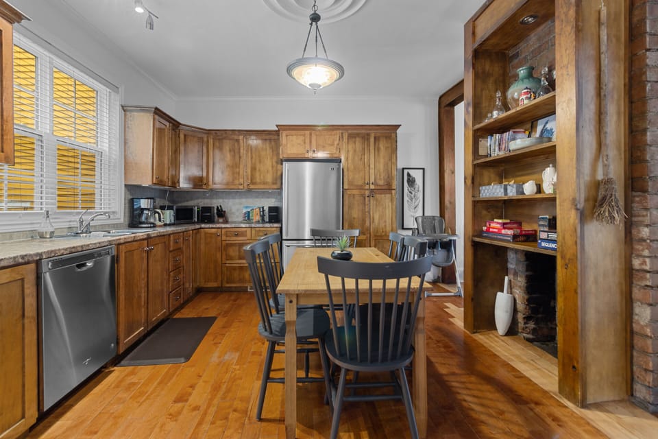 An alternate perspective of our culinary haven – the kitchen and dining area. A symphony of functionality and style for delightful moments shared.