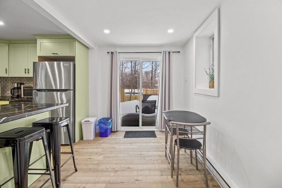 From breakfast to dinner, our stylish kitchen and dining space has everything you need!  Step outside to our inviting outdoor patio.