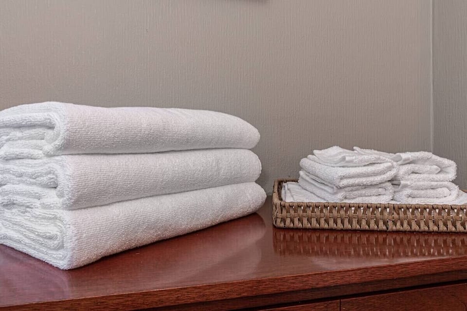Spa-quality essentials. We provide fresh, fluffy towels and premium linens for every guest.
