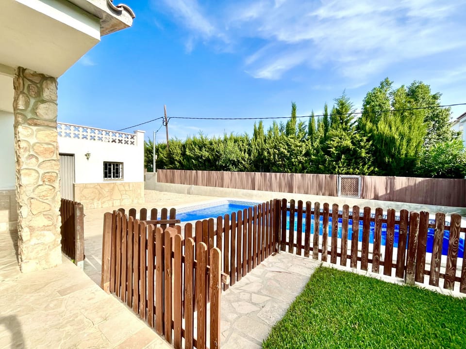 Private garden and swimming pool with gate