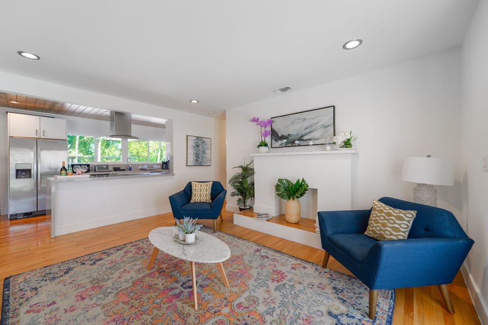 Deluxe Apartment | Living area | 50-inch plasma TV with digital channels, streaming services