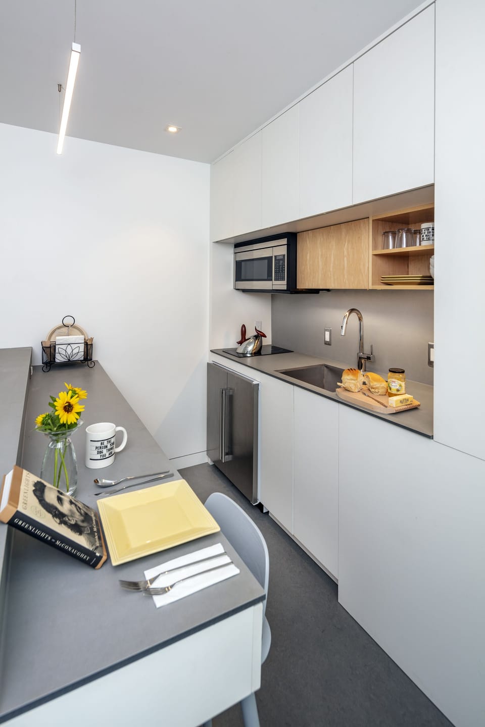 The Kitchen has a coffee station, hot water kettle, hot plate and refrigerator
