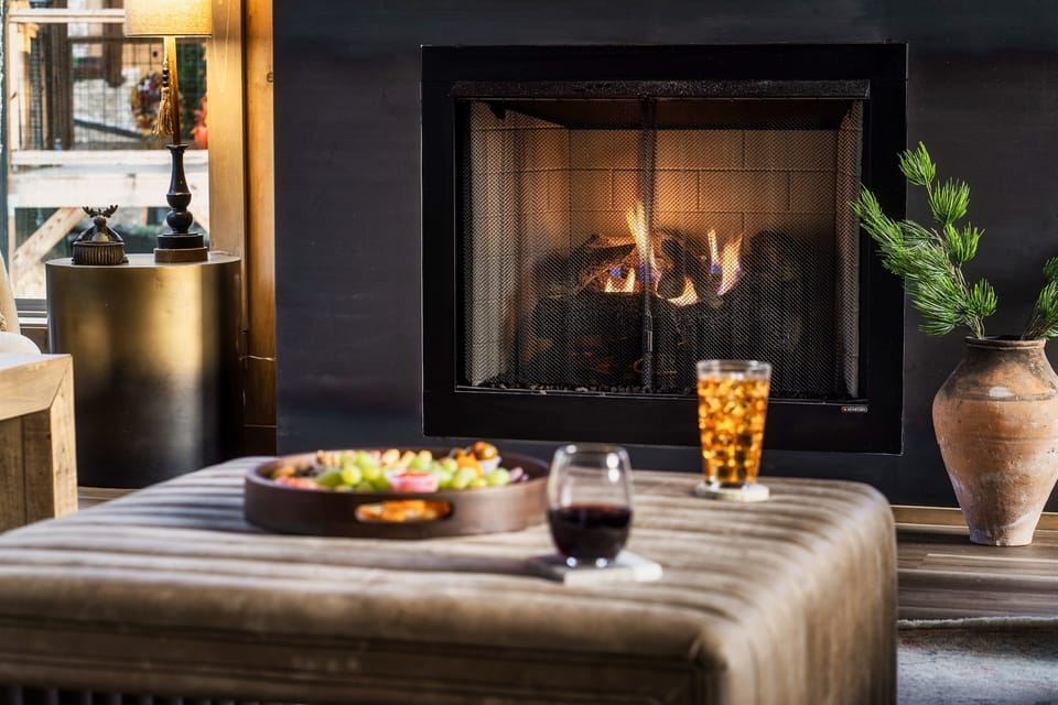 Warm by the toasty fireplace with the touch of a button!  Available from October to March.  Note: Refreshments are not included.