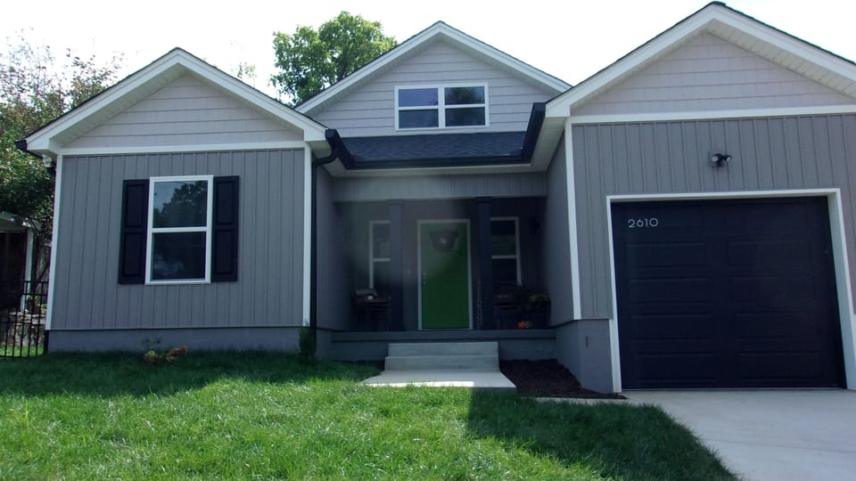 Front of House. The garage is 20' long with a 110 outlet to charge an Elec car.